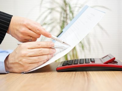 Lawyer and his client are examining legal document